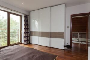 White and Oak Finish Sliding Wardrobe Design